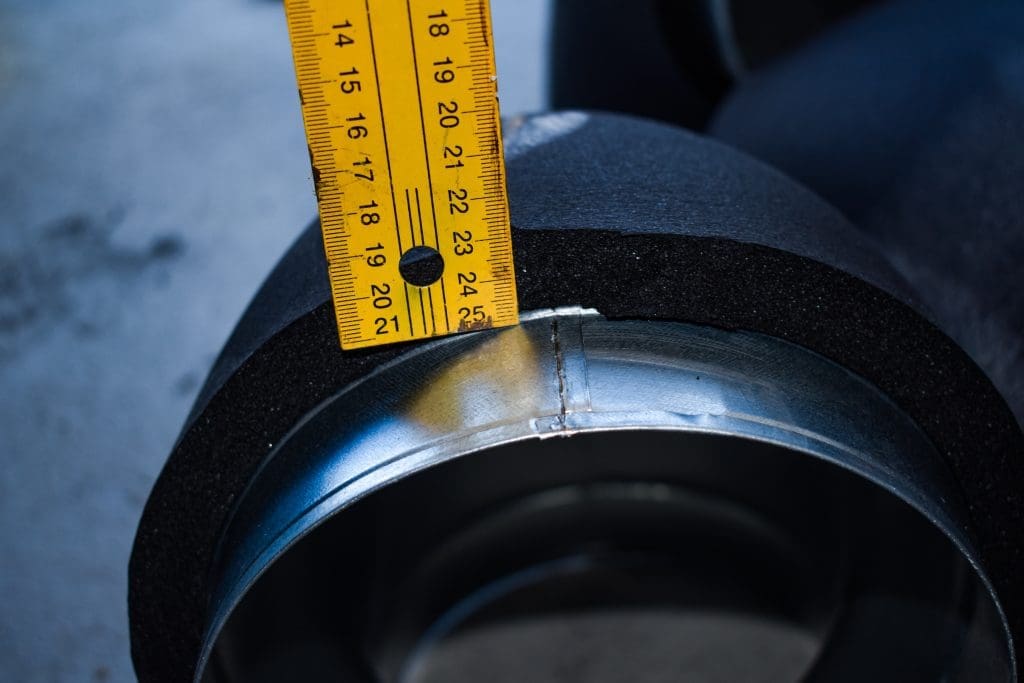 Measuring elastomeric pipe insulation thickness for condensation control on below-ambient mechanical piping